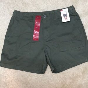 Army green shorts.
